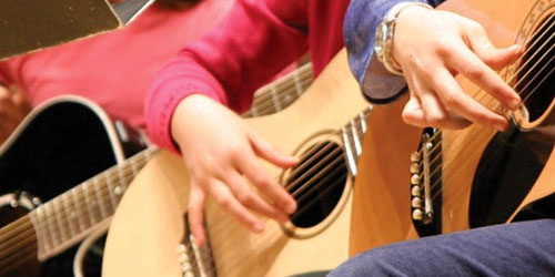 Playing guitars
